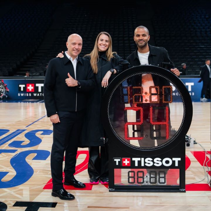 Tissot CEO Sylvain Dolla with NBA legend Tony Parker and 2024 WNBA Champion Sabrina Ionescu posing with the new Tissot Shot Clock