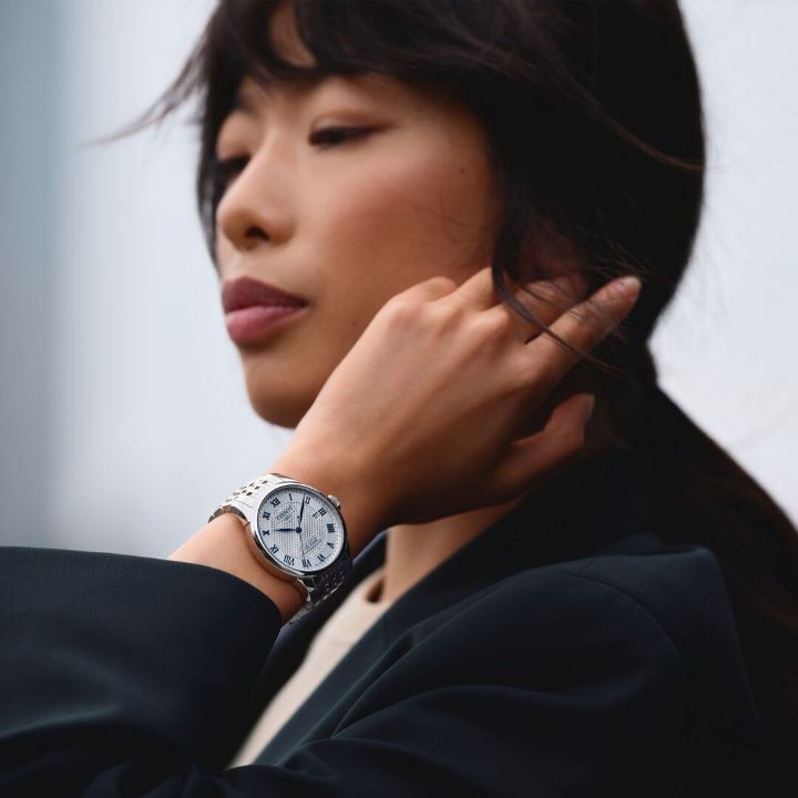 The Tissot Le Locle Powermatic 80 20th Anniversary edition on a woman model wrist