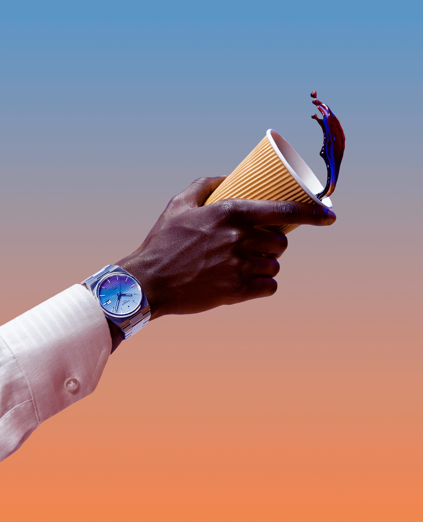 A male model posing with a PRX Graded Powermatic 80 with a coffee