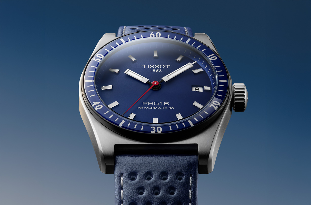 Tissot PR516 with blue dial against a dark background